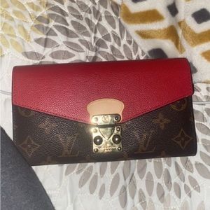 LV wallet , don’t use . minor blemishes but not really noticeable